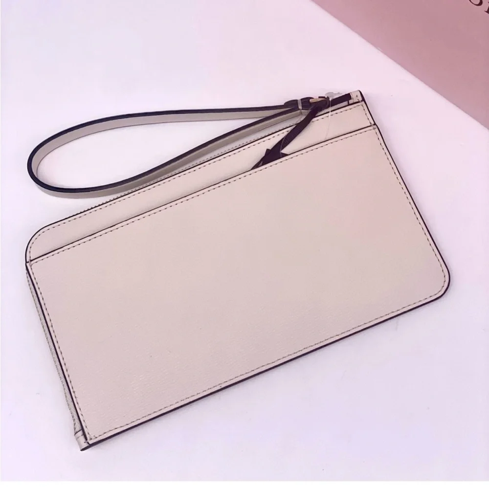 Kate Spade White Wristlet with Minnie Mouse Design
